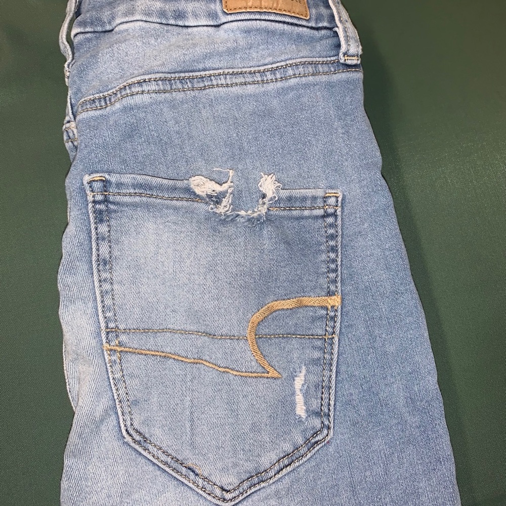 Light was ripped jeans